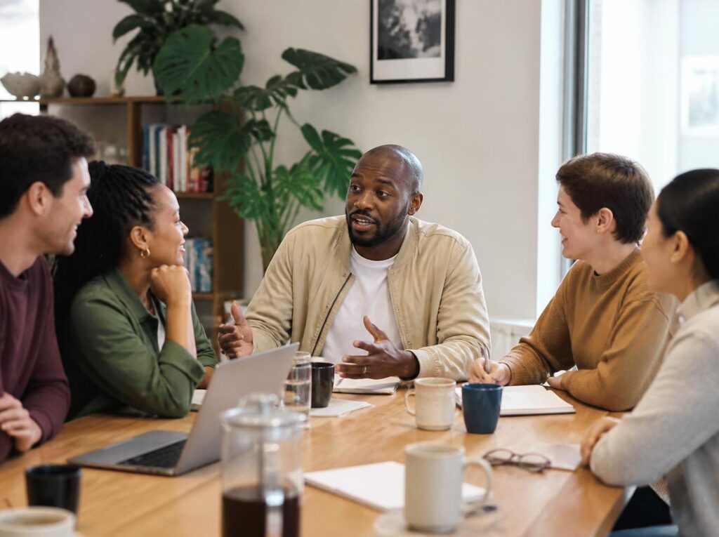 Team having an open conversation in a workplace meeting
