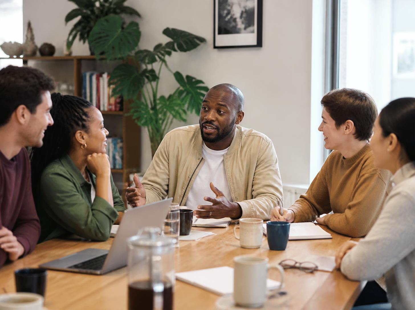 Team having an open conversation in a workplace meeting